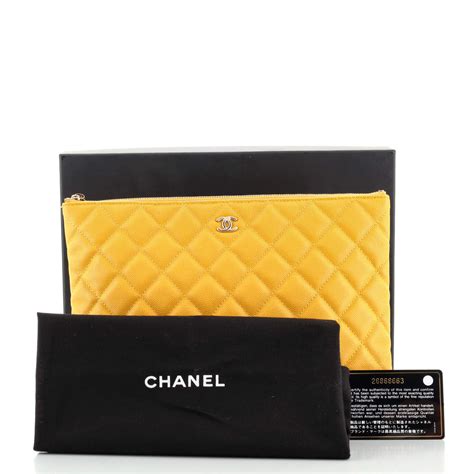 chanel quilted o case clutch|Chanel evening purse.